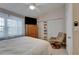 Comfortable bedroom with a ceiling fan, closet and natural light, creating a welcoming ambiance at 17960 Gulf Blvd # 111, Redington Shores, FL 33708