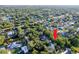 Aerial view of the property showing landscaping and neighborhood amenities at 1880 Belleair Rd, Clearwater, FL 33764