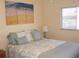 Cozy bedroom featuring a queen bed and welcoming beach themed decor at 1942 Settlement Rd # 25, Venice, FL 34285