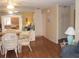 Open-concept living area seamlessly connects dining and relaxing spaces at 1942 Settlement Rd # 25, Venice, FL 34285