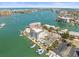 Aerial view showcases the building's waterfront location and private docks at 211 Dolphin Pt # 403, Clearwater Beach, FL 33767