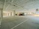 Spacious parking garage featuring ample parking spaces and a clean, well-lit environment at 211 Dolphin Pt # 403, Clearwater Beach, FL 33767