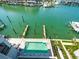Rooftop pool overlooking a marina at 211 Dolphin Pt # 403, Clearwater Beach, FL 33767
