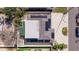Aerial top down of a home with solar panels on the roof at 233 45Th Ave, St Pete Beach, FL 33706
