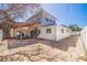 Spacious backyard featuring an outdoor living space with brick pavers and lush landscaping at 233 45Th Ave, St Pete Beach, FL 33706