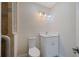 Clean bathroom with a new vanity, lighting and a tiled shower with a glass door at 233 45Th Ave, St Pete Beach, FL 33706