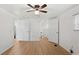 Spacious bedroom leading to an en suite bathroom, with hardwood floors at 27477 Old Trilby Rd, Brooksville, FL 34602