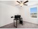 Bedroom with ceiling fan with natural light and a computer setup at 2870 Silver Scallop Dr, Wimauma, FL 33598
