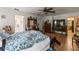 Bright main bedroom featuring an ensuite bathroom and closet space at 29133 Lawton Dr, Nobleton, FL 34661