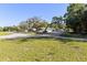 A roadside building with a parking area captures the essence of a commercial property or community hub at 29133 Lawton Dr, Nobleton, FL 34661
