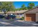 Townhouse exterior with easy parking and single car garage at 3135 Charter Club Dr # G, Tarpon Springs, FL 34688