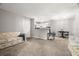 Open-concept living area seamlessly connects to the kitchen, great for entertaining and Gathering gatherings at 3241 Fox Chase N Cir # 106, Palm Harbor, FL 34683