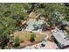 Aerial view of shuffleboard courts in community with nearby pool at 3241 Fox Chase N Cir # 106, Palm Harbor, FL 34683