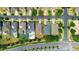 Aerial view of the property showing the neighborhood layout and street access at 32648 Coldwater Creek Loop, Wesley Chapel, FL 33545