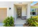 Welcoming entrance with stone accents and a clear view through the front door at 32648 Coldwater Creek Loop, Wesley Chapel, FL 33545