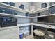 Cozy office with built-in shelving, a spacious desk area, and neutral paint at 32791 Natural Bridge Rd, Wesley Chapel, FL 33543