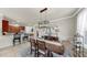 Formal dining room is adjacent to the kitchen for easy access and serving at 334 Mystic Falls Dr, Apollo Beach, FL 33572