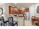 Kitchen has stainless steel appliances, granite countertops, and ample cabinet space at 334 Mystic Falls Dr, Apollo Beach, FL 33572