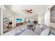 Inviting living room with an open floor plan to the dining area and access to other rooms at 334 Mystic Falls Dr, Apollo Beach, FL 33572