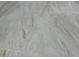 Close-up of beige ceramic tile flooring with beautiful texture at 34141 Tree Lake Dr, Wesley Chapel, FL 33543