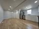 Spacious kitchen features new stainless steel appliances, ample counter space, and light wood flooring at 34141 Tree Lake Dr, Wesley Chapel, FL 33543