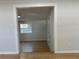 The living room features light-colored walls and hardwood flooring at 34141 Tree Lake Dr, Wesley Chapel, FL 33543