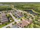 Residential aerial view highlighting nearby ponds and tree lined street at 4194 Bexley Village Dr, Land O Lakes, FL 34638