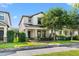 Charming two-story home with well-manicured lawn and stone accents on the front porch columns at 4194 Bexley Village Dr, Land O Lakes, FL 34638