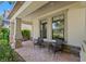 Inviting front porch with comfortable seating, perfect for enjoying the outdoors and neighborhood views at 4194 Bexley Village Dr, Land O Lakes, FL 34638