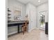 A unique office nook space with a desk and cabinetry, offering a practical workspace at 4194 Bexley Village Dr, Land O Lakes, FL 34638