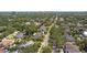 Aerial view of the neighborhood featuring mature trees and proximity to the downtown skyline at 4301 W Swann Ave, Tampa, FL 33609
