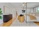 Spacious bedroom with hardwood floors, four-poster bed, and elegant modern decor at 4301 W Swann Ave, Tampa, FL 33609