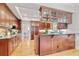 Updated kitchen with granite countertops, stainless steel appliances and wood cabinets at 4301 W Swann Ave, Tampa, FL 33609
