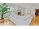 Bright and airy living room featuring hardwood floors, fireplace, and lots of natural light at 4301 W Swann Ave, Tampa, FL 33609