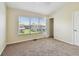 Bedroom featuring neutral carpet, a window and a closet at 4516 Barnstead Dr, Riverview, FL 33578