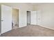 Bright bedroom featuring neutral carpet, light walls and bathroom access at 4516 Barnstead Dr, Riverview, FL 33578