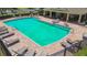 Beautiful community pool with lounge chairs and tables for relaxation and enjoyment at 4516 Barnstead Dr, Riverview, FL 33578