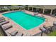Beautiful community pool with lounge chairs and tables for relaxation and enjoyment at 4516 Barnstead Dr, Riverview, FL 33578