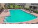 A refreshing community pool area surrounded by lounge chairs and manicured landscaping at 4516 Barnstead Dr, Riverview, FL 33578