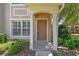 Inviting front entrance with covered porch and neatly landscaped surroundings at 4516 Barnstead Dr, Riverview, FL 33578