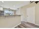 Open kitchen design with granite countertops and nearby staircase at 4516 Barnstead Dr, Riverview, FL 33578