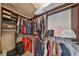 Well-organized walk-in closet with shelving and hanging rods, providing ample storage space for clothes and accessories at 4916 Chatham Gate Dr, Riverview, FL 33578