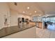 Open-concept kitchen with stainless appliances and views to the living room and natural light at 4916 Chatham Gate Dr, Riverview, FL 33578