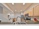 Open kitchen showcasing modern stainless appliances and access to the home's living areas at 4916 Chatham Gate Dr, Riverview, FL 33578
