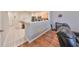 Cozy living area with an open layout to the kitchen and wood-look flooring at 4916 Chatham Gate Dr, Riverview, FL 33578
