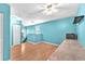 Bright room with light vinyl floors, a ceiling fan, and a staircase to an upper floor at 5116 Corvette Dr, Tampa, FL 33624