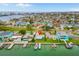 An aerial view shows this waterfront home with easy ocean access in a beautiful coastal community at 525 Lillian Dr, Madeira Beach, FL 33708