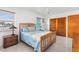 Bright bedroom with terrazzo floor, a comfortable bed, closet, and plenty of natural light, creating a relaxing retreat at 525 Lillian Dr, Madeira Beach, FL 33708