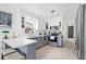 Updated kitchen with stainless steel appliances and a breakfast bar with seating at 525 Lillian Dr, Madeira Beach, FL 33708