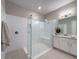 Modern bathroom showcasing a walk-in shower, white subway tile, and sleek fixtures at 5329 Windy Grove Dr, Wimauma, FL 33598